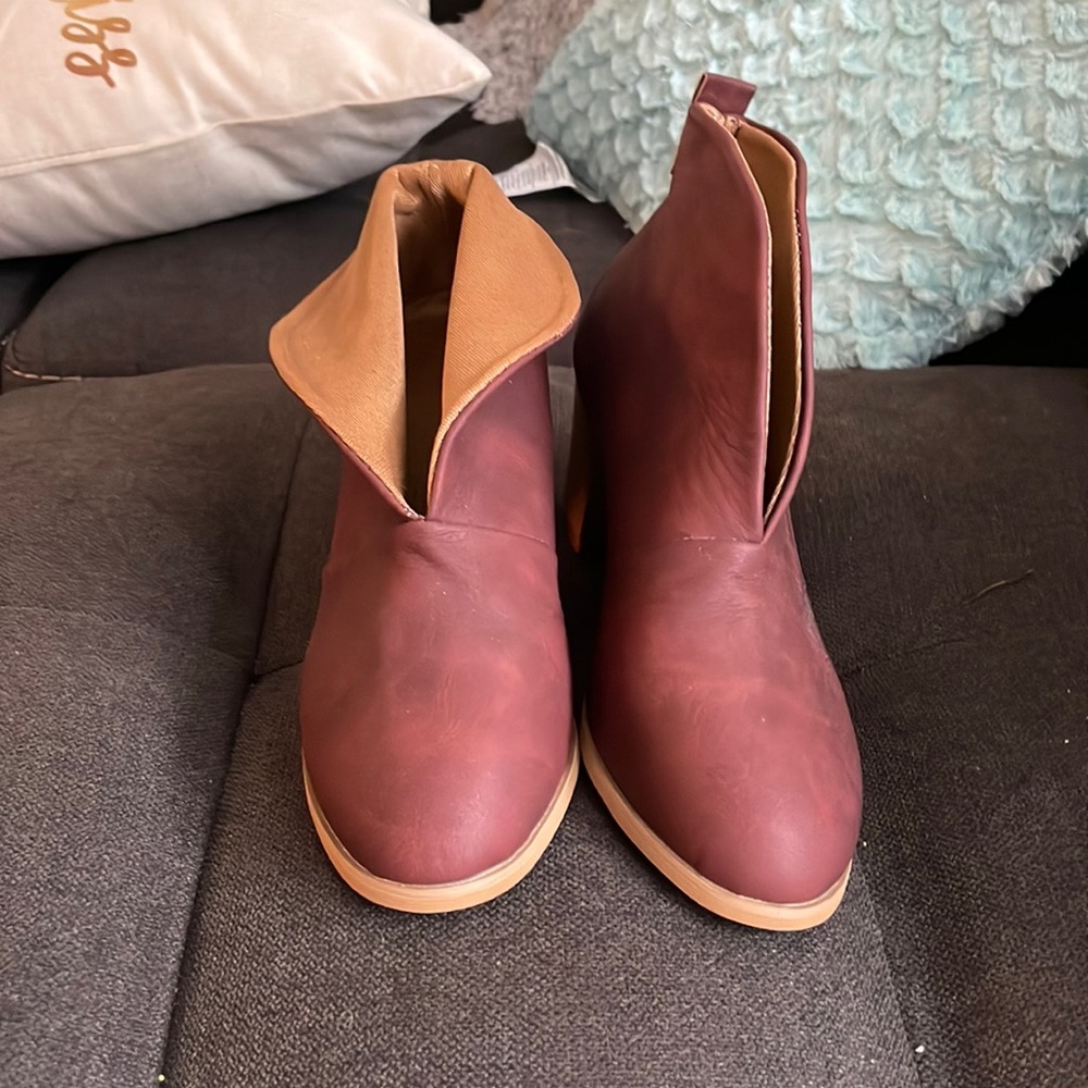 Pair of never worn maroonish brown ankle booties.